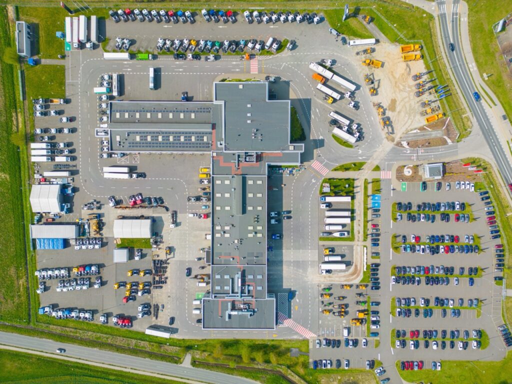 Logistics,Park,With,Warehouse.,Semi-trailers,Trucks,Standing,On,Car,Parking