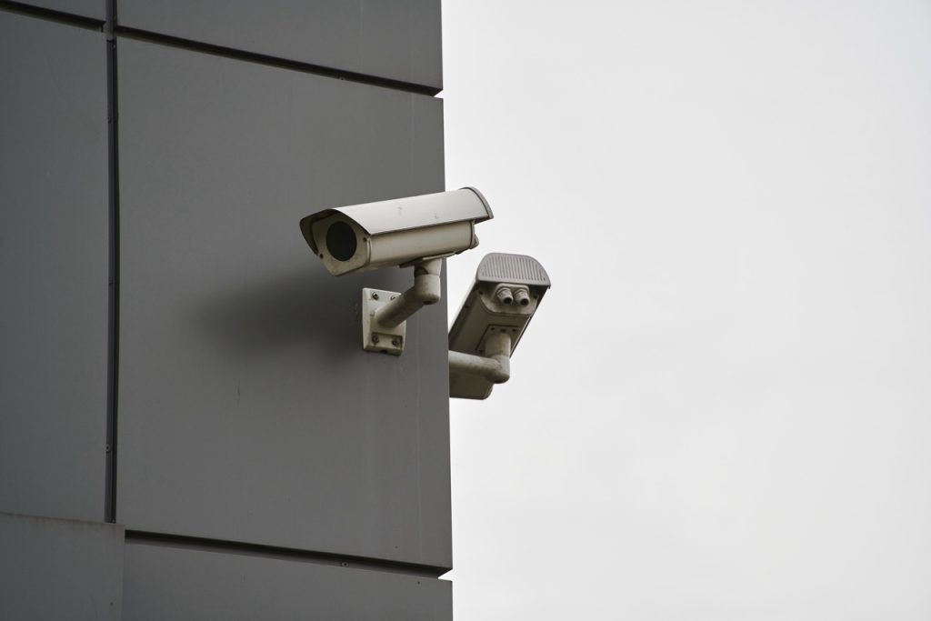 Exterior surveillance camera monitoring a distribution center perimeter. 