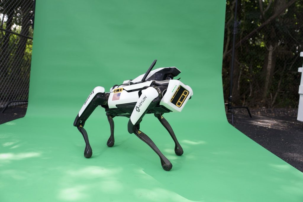 Front three-quarter view of Asylon DroneDog automated security robot equipped with cameras and sensors for automated perimeter patrols. 